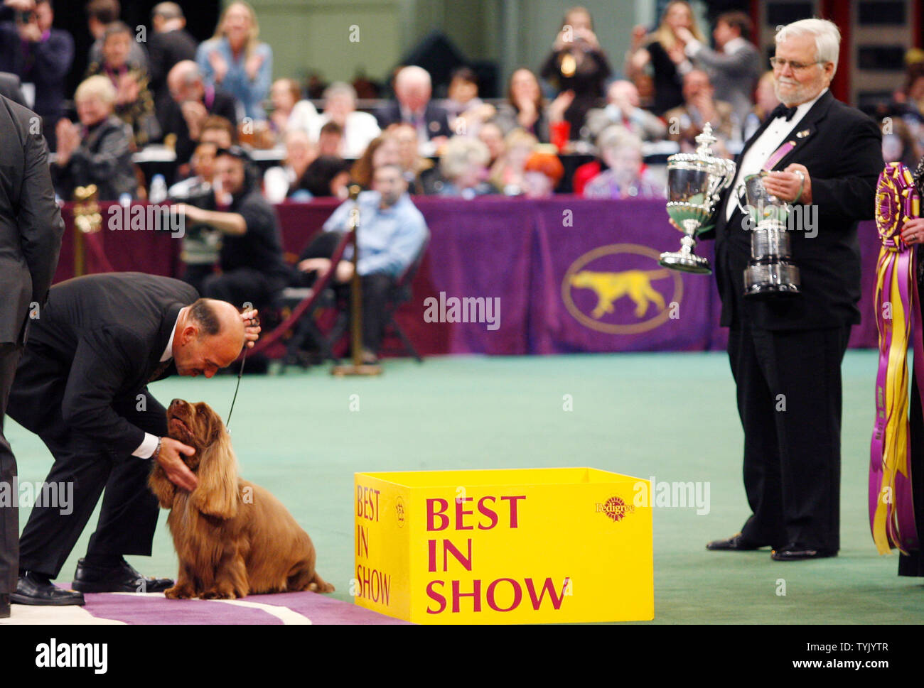Handler Scott Sommer reacts while standing in the winners circle with(02)