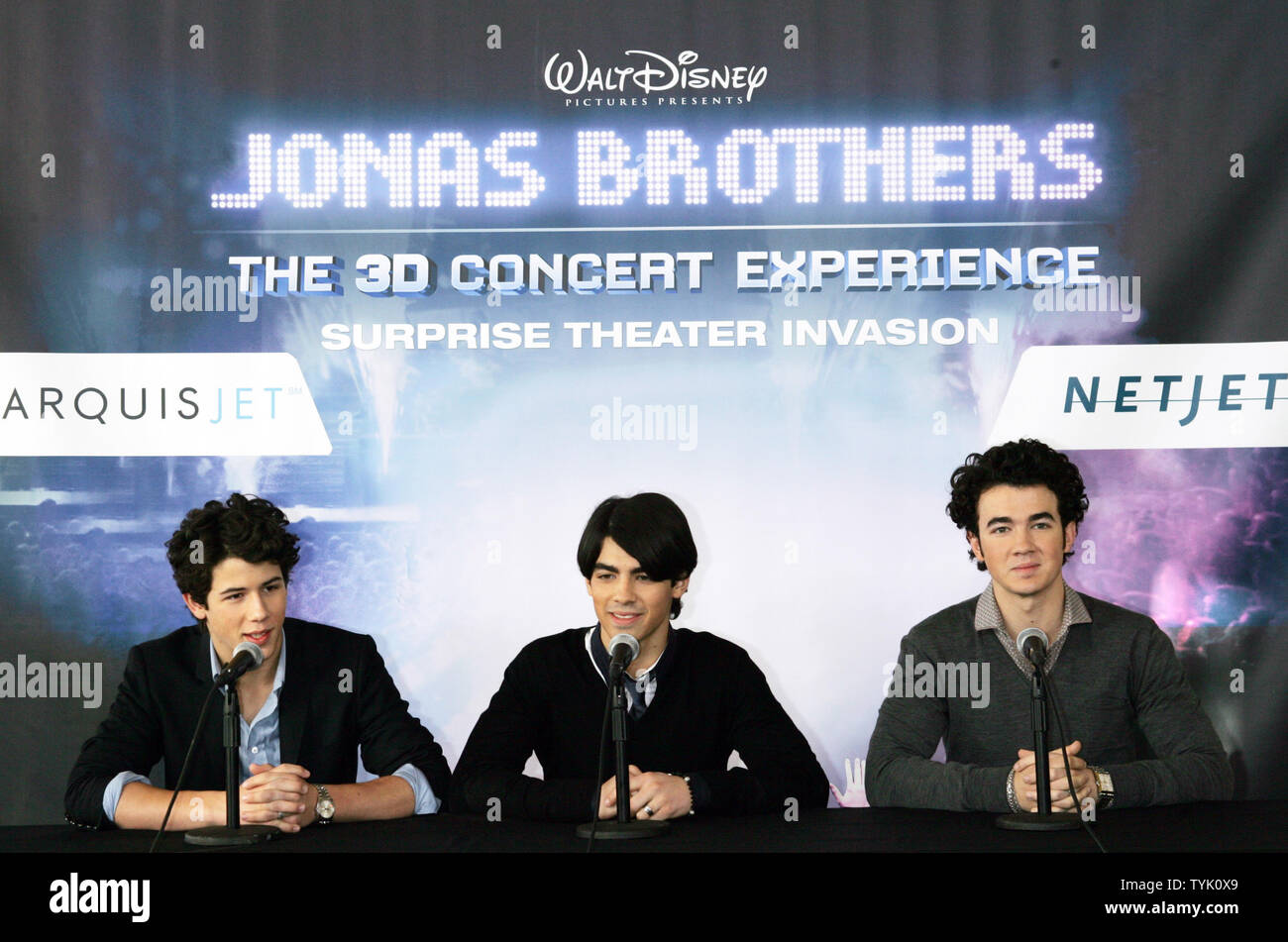 The Jonas Brothers (L-R) Nick, Joe and Kevin attend a press conference about embarking on their 'Surprise Theater Invasion' at the Westchester Airport in New York on February 28, 2009.  (UPI Photo/Laura Cavanaugh) Stock Photo