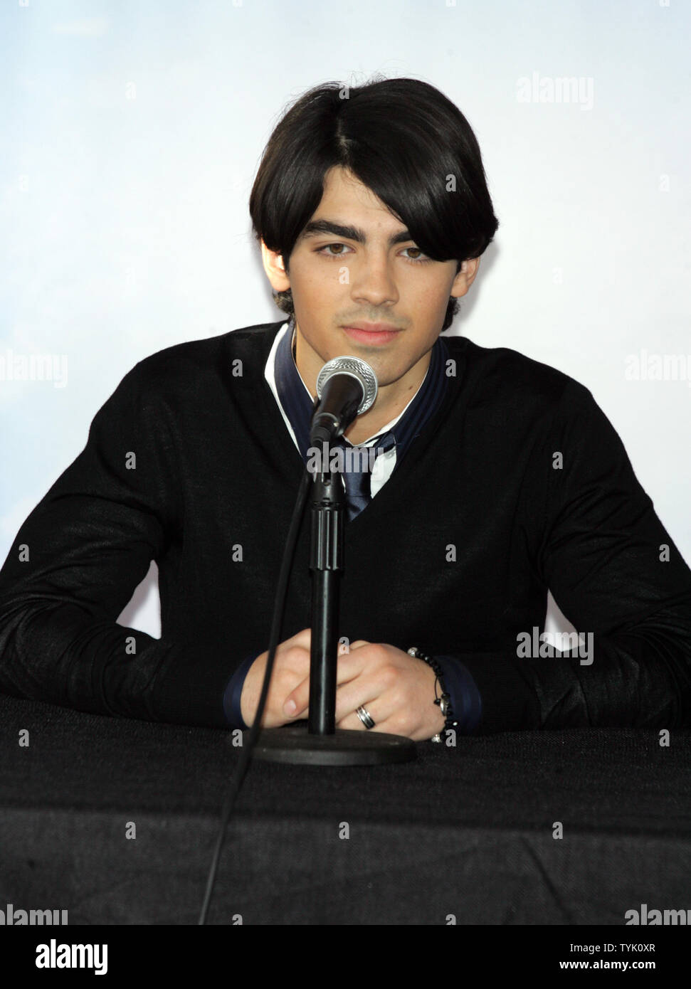 The Jonas Brothers' Joe Jonas attends a press conference about embarking on their 'Surprise Theater Invasion' at the Westchester Airport in New York on February 28, 2009.  (UPI Photo/Laura Cavanaugh) Stock Photo