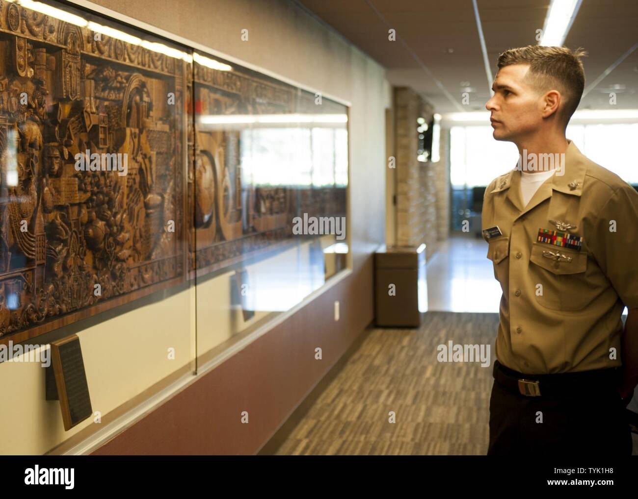 COLLEGE STATION, Texas (Nov. 16, 2016) Petty Officer 2nd Class Andrew Tonski, 2016 Junior Sailor of the Year for the aircraft carrier USS George H.W. Bush (CVN 77), views the history of Texas A&M University during a tour of the campus at College Station, Texas. The tour is part of a two-day namesake trip to Texas where Sailors engaged with the local community about the importance of the Navy. Stock Photo