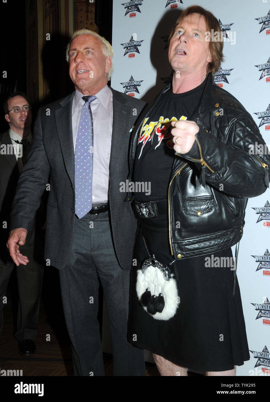 WWE Hall of Famers Ric 'Nature Boy' Flair and Rowdy Roddy Piper (L to R) attend a press conference at New York's Hard Rock Cafe to promote the 25th anniversary of Wrestlemania to be held on April 5, 2009 in Houston Texas.  (UPI Photo/Ezio Petersen) Stock Photo