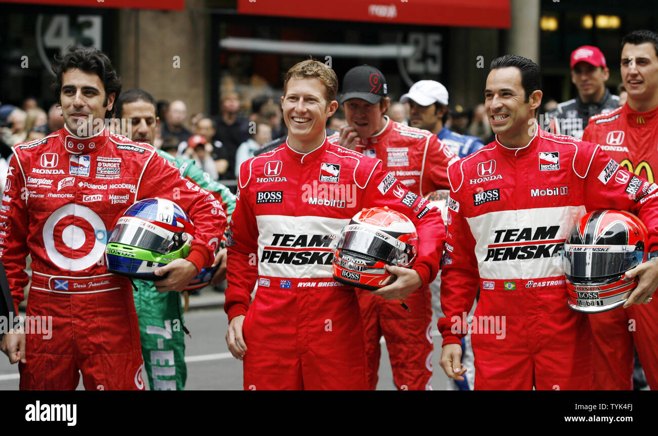 Dario Franchitti, Ryan Briscoe, Helio Castroneves (R) and all 33 drivers participating in the 2009 Indianapolis 500 stand in Herald Square in New York City on May 18, 2009.    (UPI Photo/John Angelillo) Stock Photo