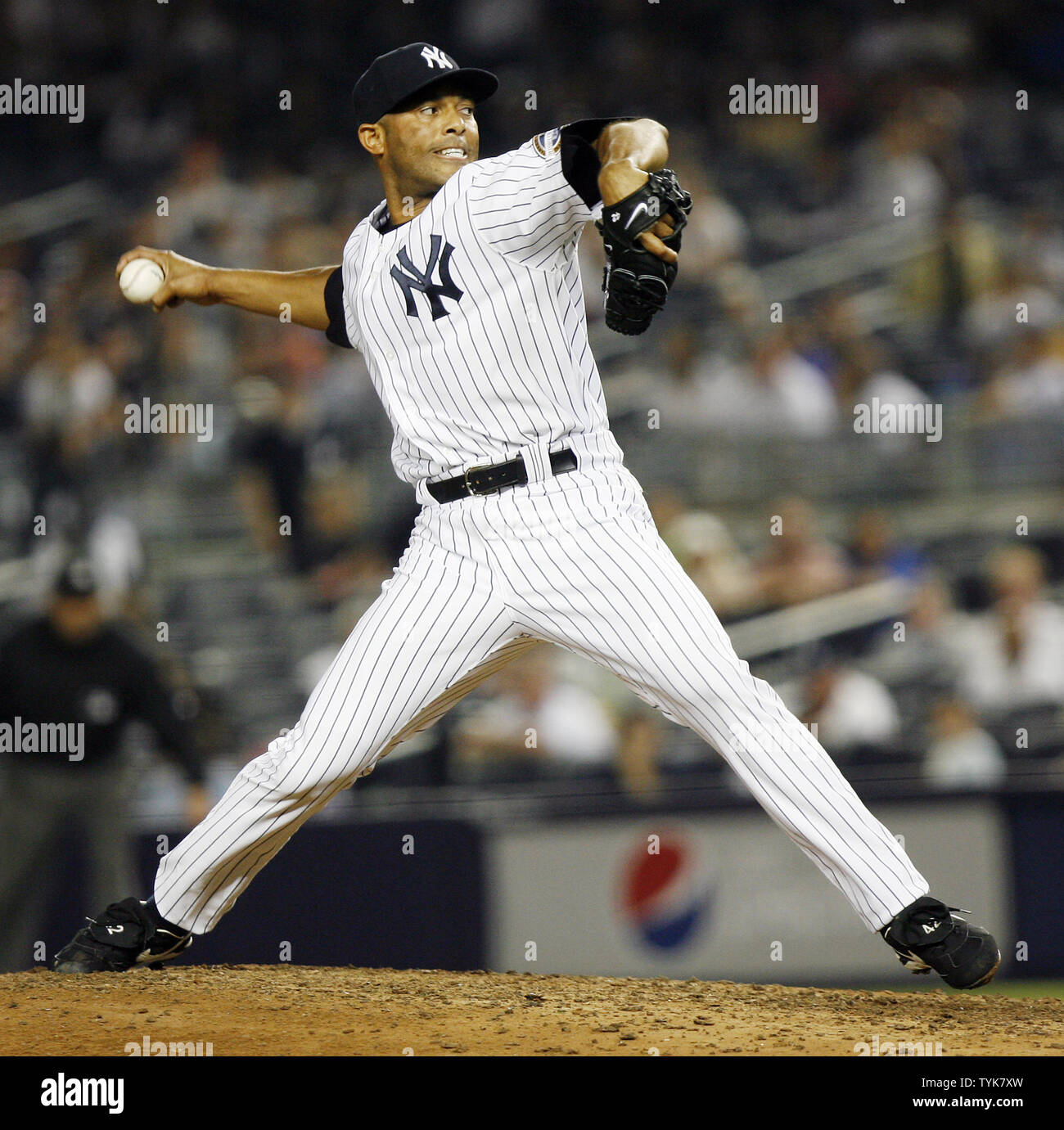 New York Yankees closer Mariano Rivera throws a pitch in the ninth inning against the Seattle
