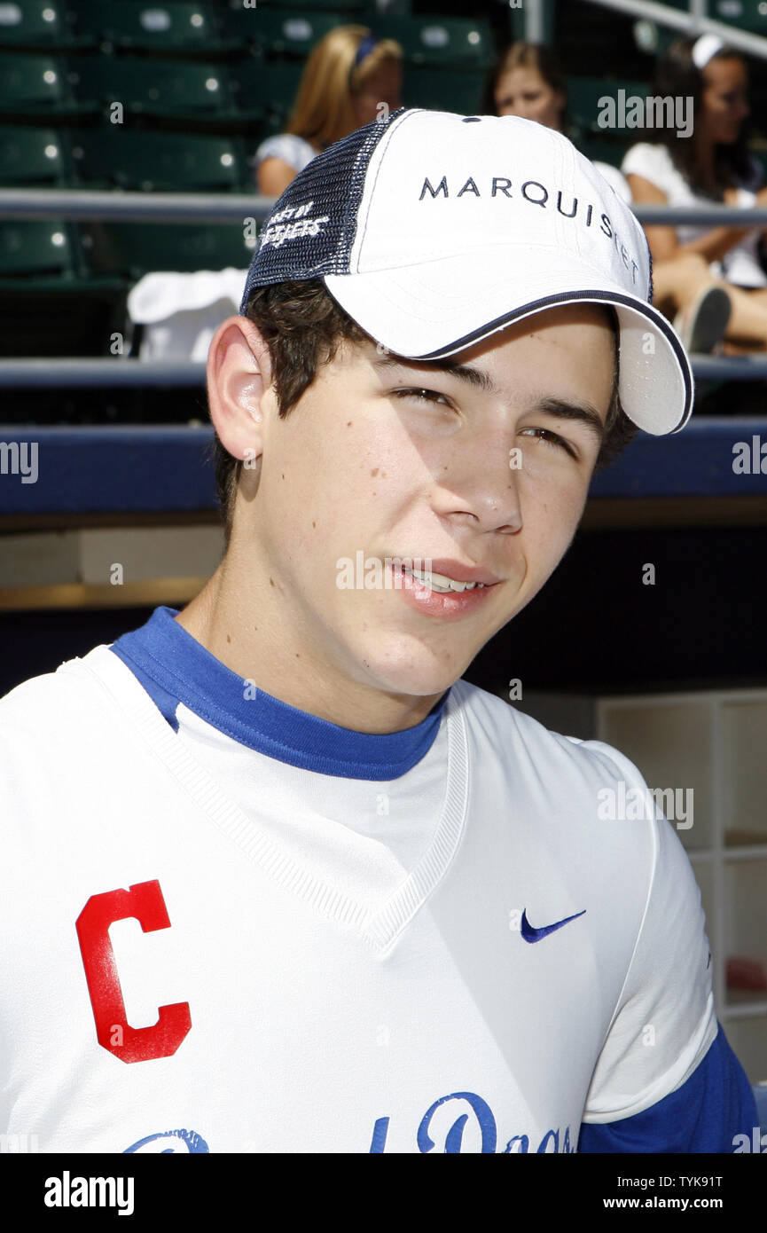 Nick Jonas of the Jonas Brothers waits to play softball against a team of  Marquis Jet and NetJets players at Newark Bears Stadium in Newark, New  Jersey on July 15, 2009. (UPI