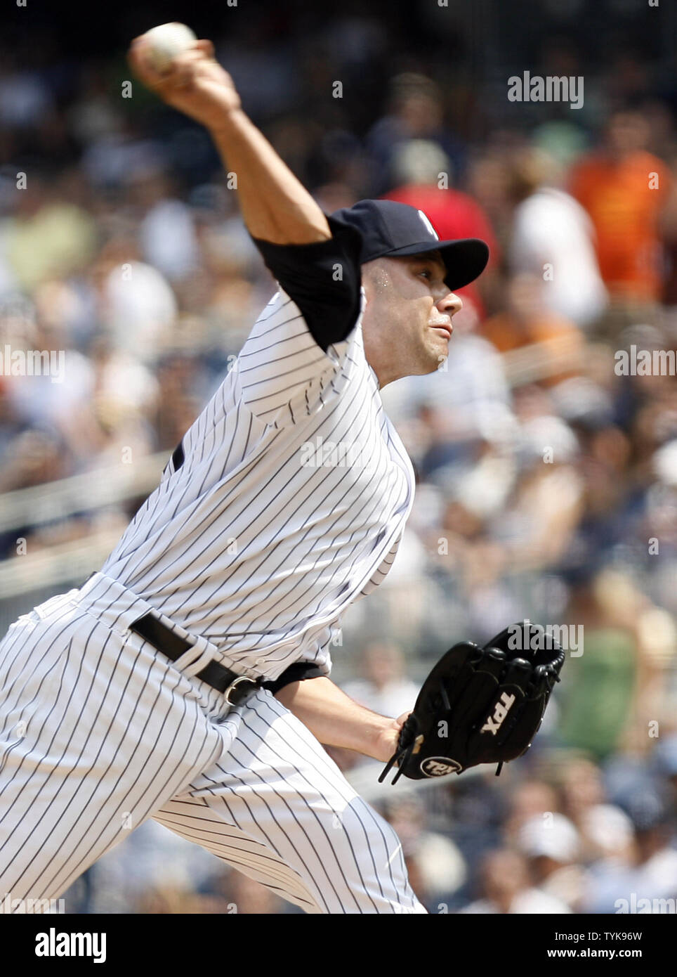 New York Yankees relief pitcher Alfredo Aceves throws a pitch in the
