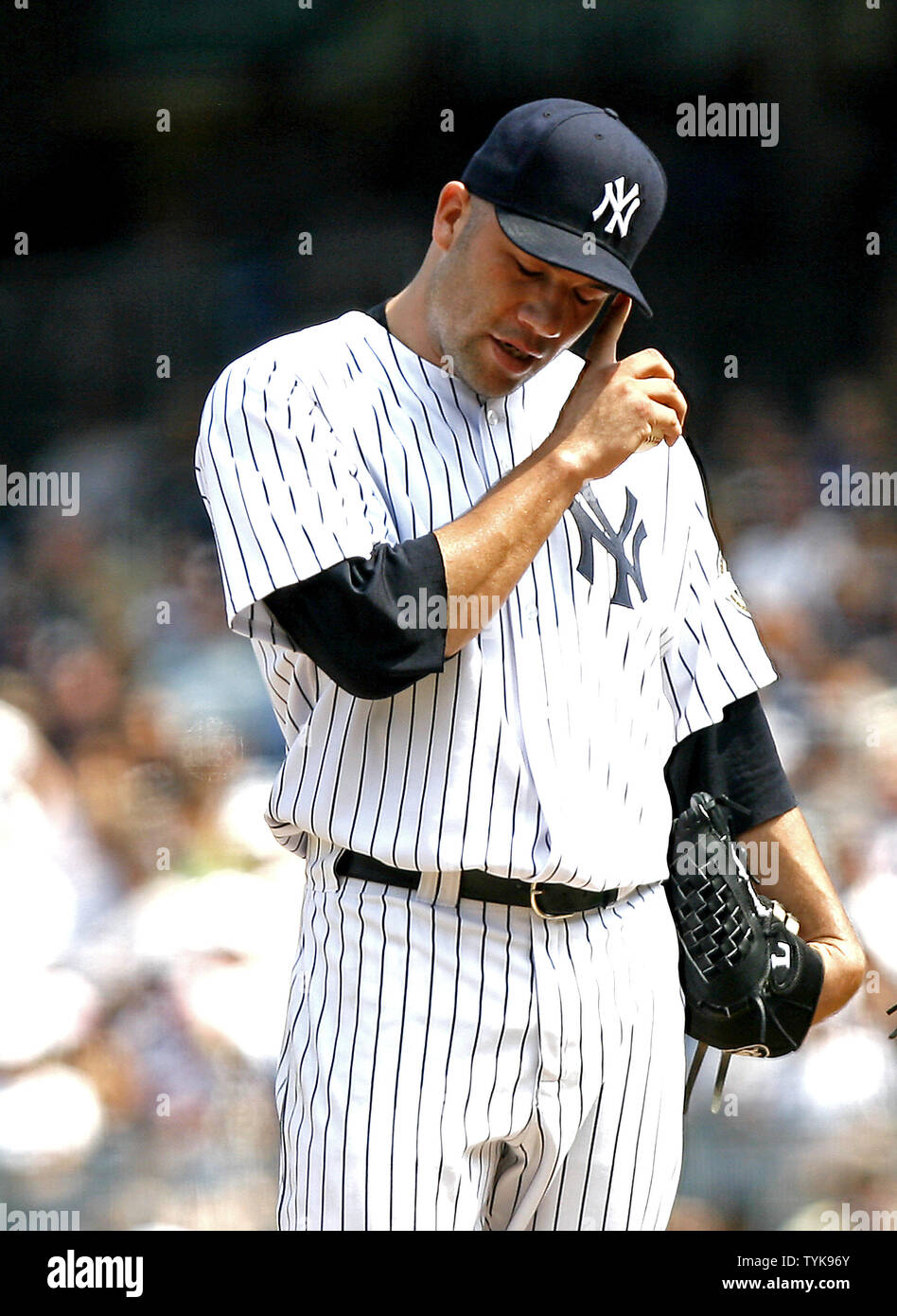 New York Yankees relief pitcher Alfredo Aceves reacts after Oakland