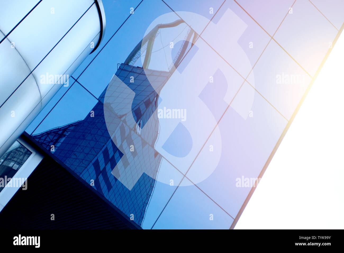 Modern office building with sign USD on a background of the blue sky ...