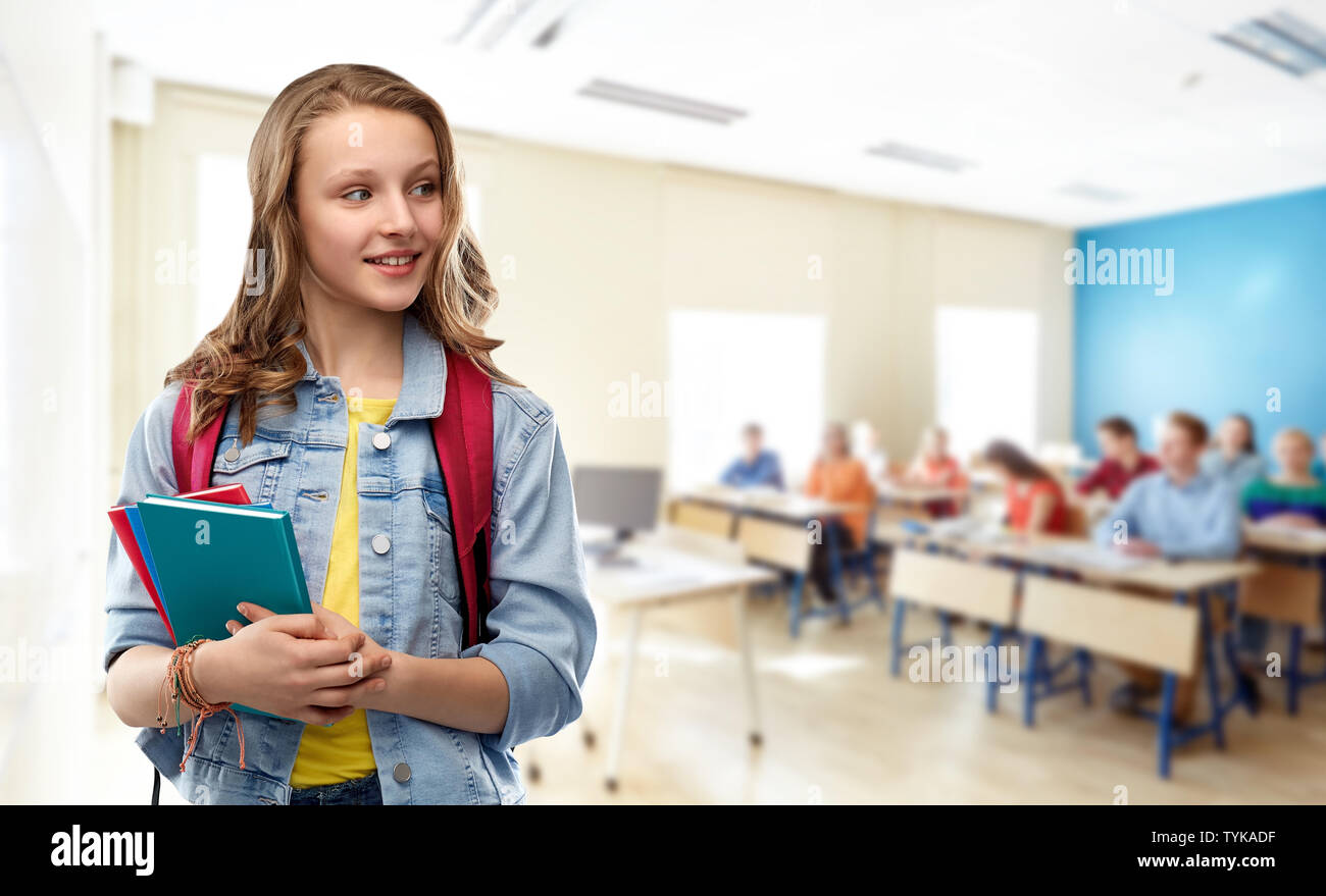 happy smiling teenage student girl with school bag Stock Photo - Alamy