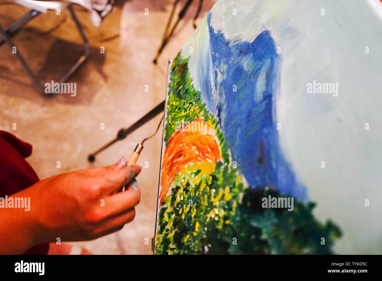 Adults painting hi-res stock photography and images - Alamy