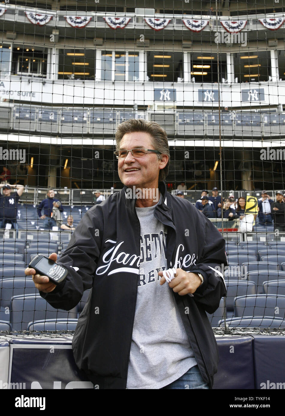 Actor Kurt Russell watches batting practice before the New York Yankees  play game 2 of the ALDS against the Minnesota Twins at Yankee Stadium in  New York City on October 9, 2009.