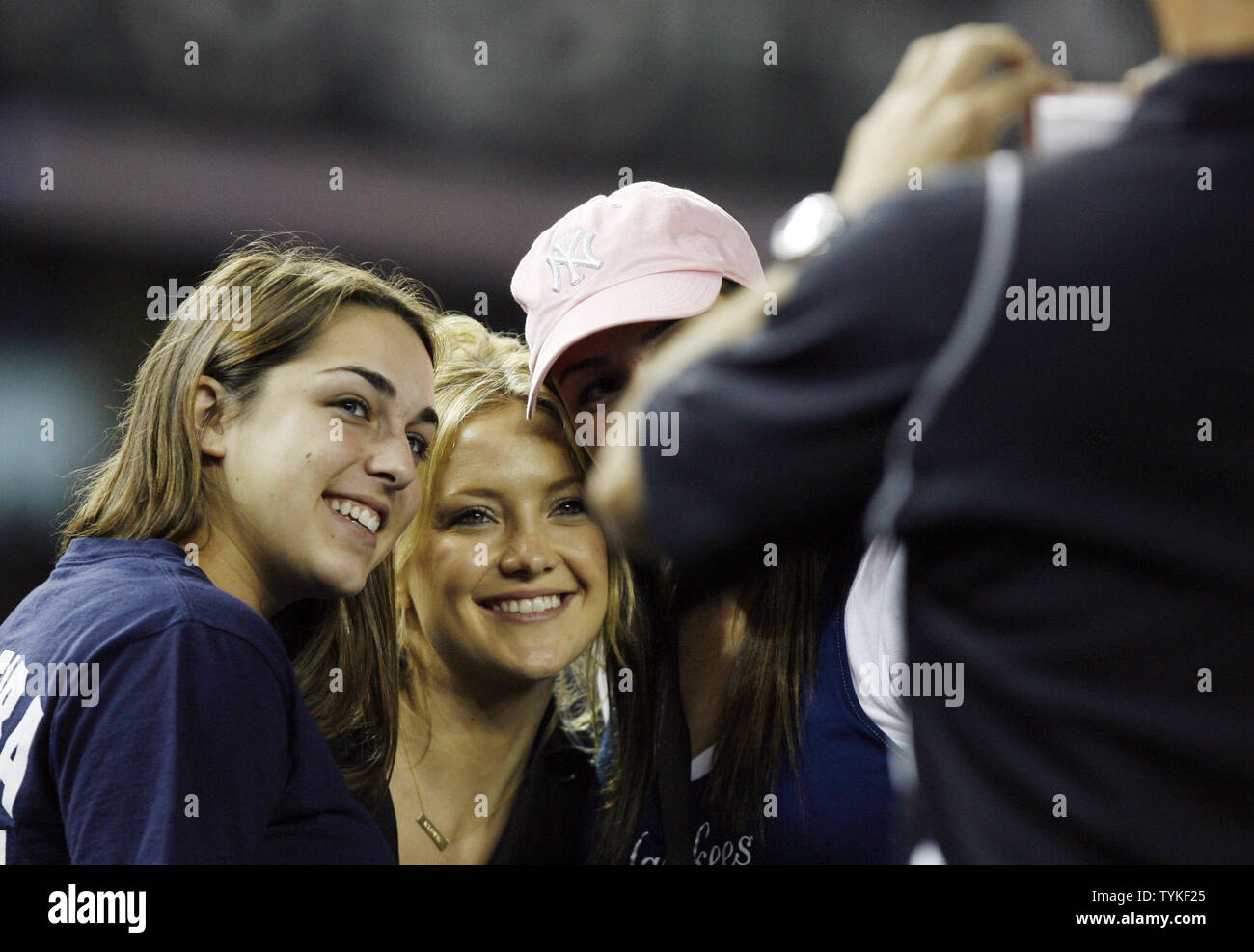 Kate Hudson takes pictures with fans while the New York Yankees play