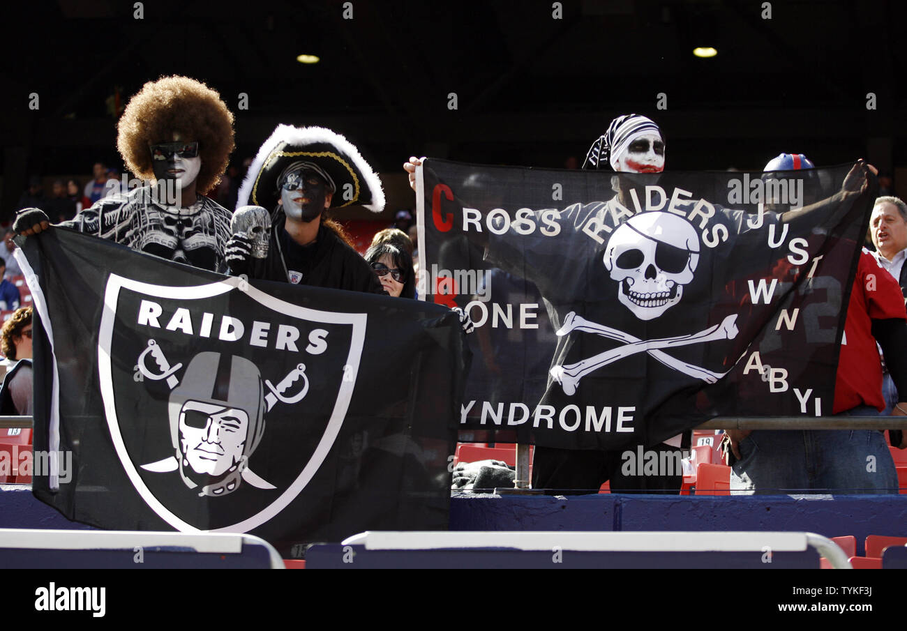 Oakland Raiders fans dress up for a road game against the New York