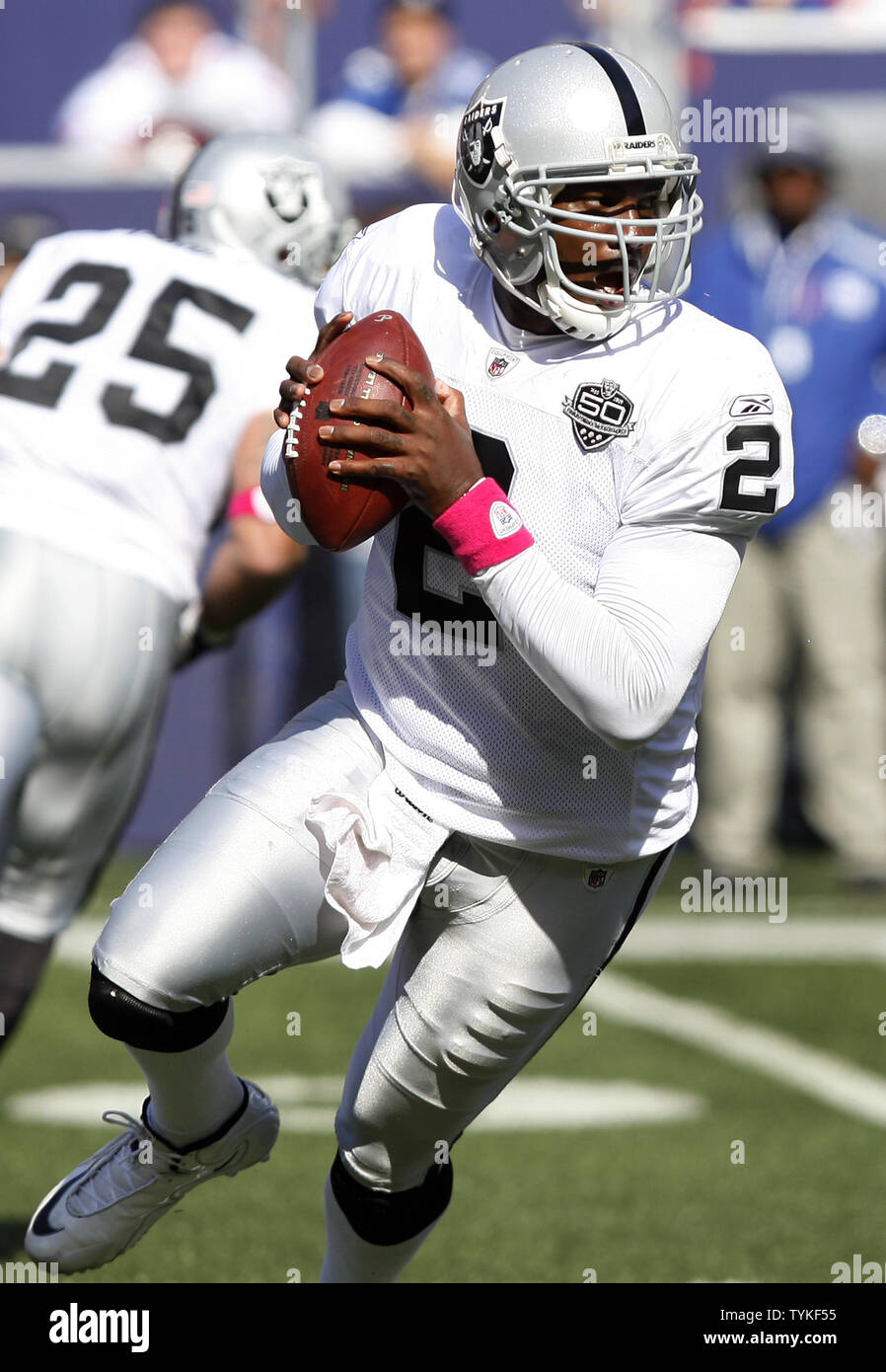 Oakland Raiders quarterback JaMarcus Russell runs out of the pocket in the  second quarter against the New York Giants in week 5 of the NFL season at  Giants Stadium in East Rutherford,