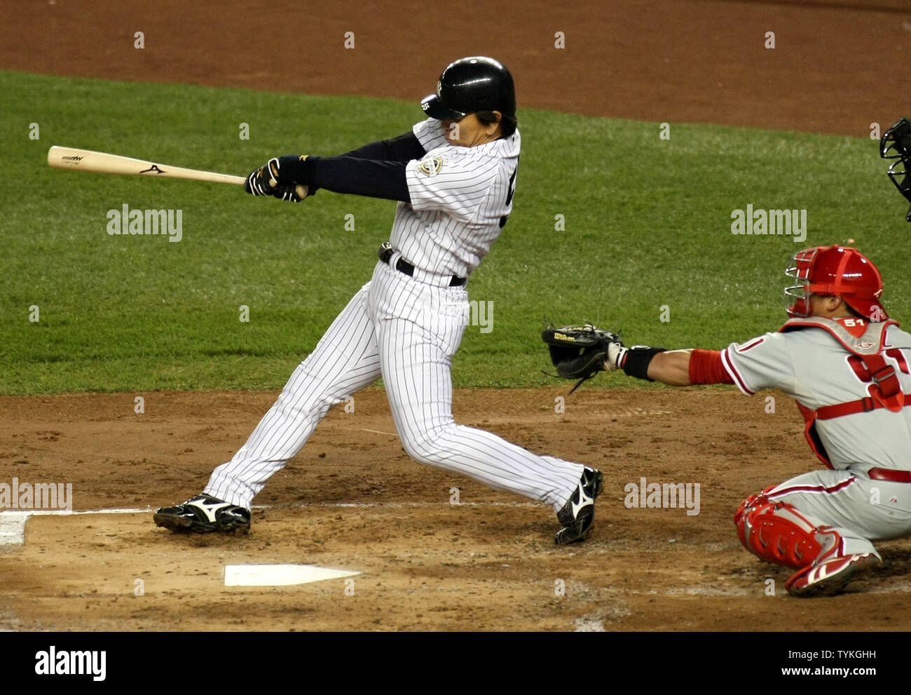 New York Yankees' Hideki Matsui hits a two-run homer off of the  Philadelphia Phillies in the second inning of game six of the World Series  at Yankee Stadium on November 4, 2009