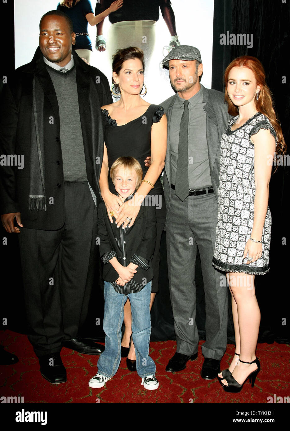 Quinton Aaron (L), Sandra Bullock, second left, Jae Head, center, Tim