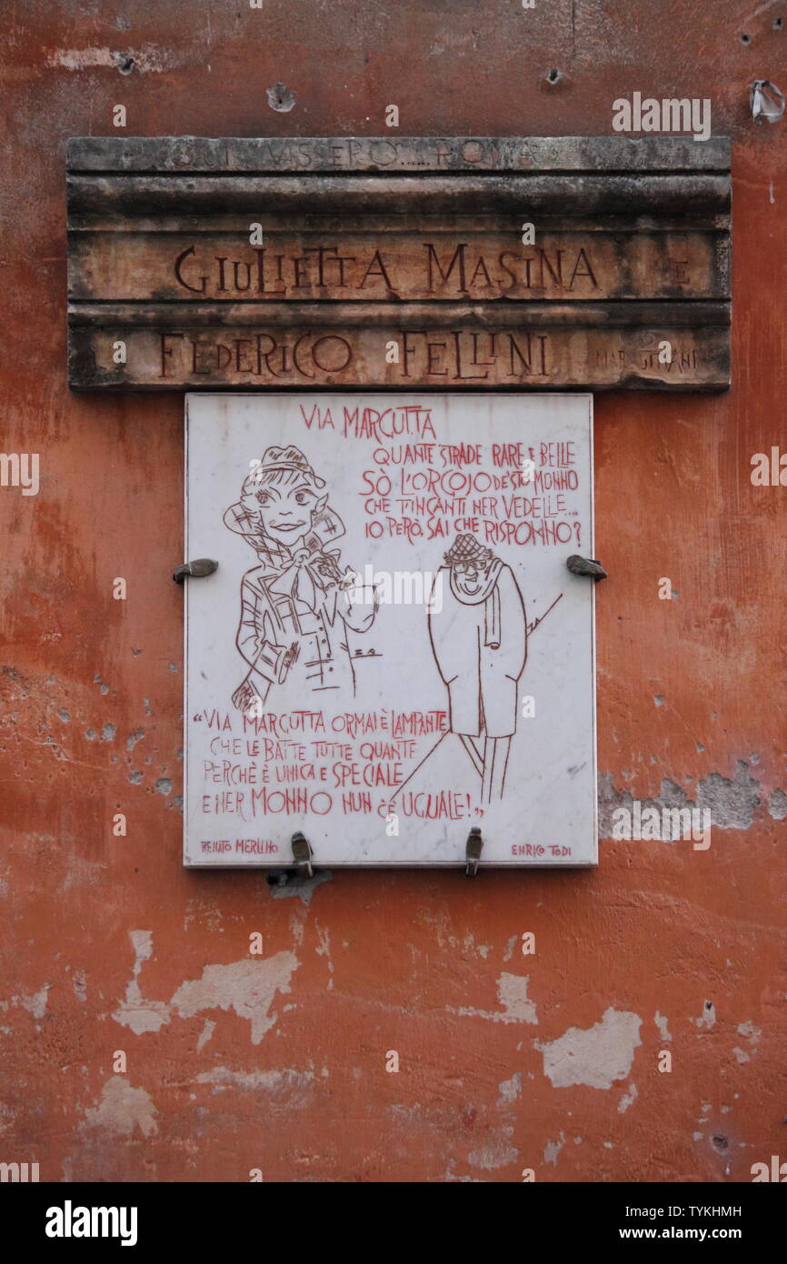 Rome, Italy - December 31, 2011: Historical inscription in memory of Federico Fellini and Gilietta Masina in Margutta Street Stock Photo