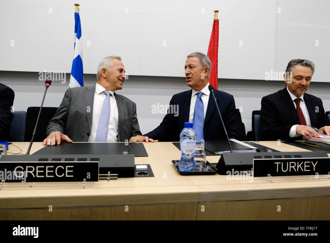 Brussels, Belgium. 26th June 2019. Turkey's Minister of National Defence, Hulusi Akar meets Minister of National Defence of Greece Evangelos Apostolakis within NATO Defense Ministers' meeting. Credit: ALEXANDROS MICHAILIDIS/Alamy Live News Stock Photo