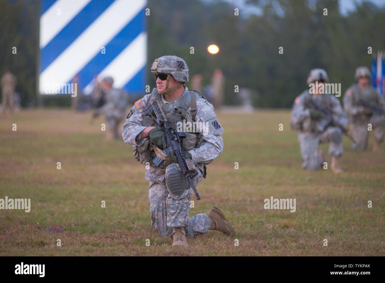 Dogface Soldiers assigned to 3rd Infantry Division wear historical and  modern uniforms to symbolize the divisions involvement in past major  military conflicts since its conception 104 years ago during a twilight  tattoo