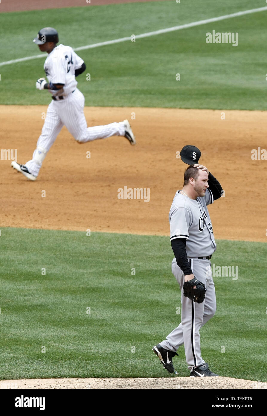Chicago White Sox starting pitcher Mark Buehrle reacts as New York