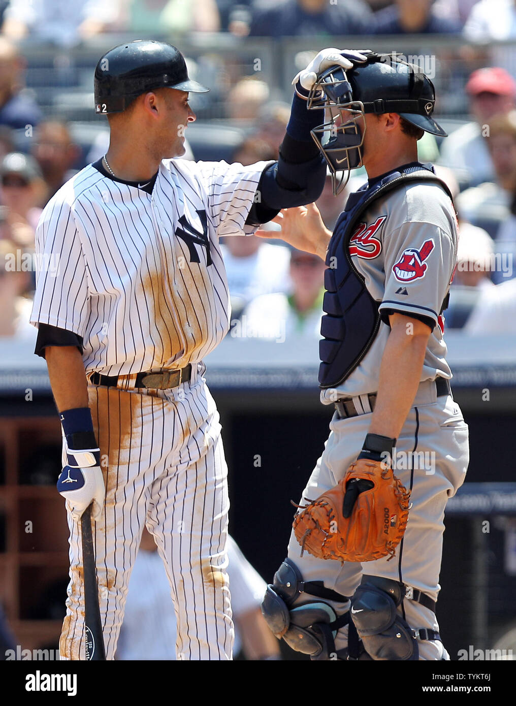 New York Yankees Derek Jeter reacts with Cleveland Indians Lou Marson after being hit by a pitch from Mitch Talbo in the second inning at Yankee Stadium in New York City on May 31, 2010.   UPI/John Angelillo Stock Photo