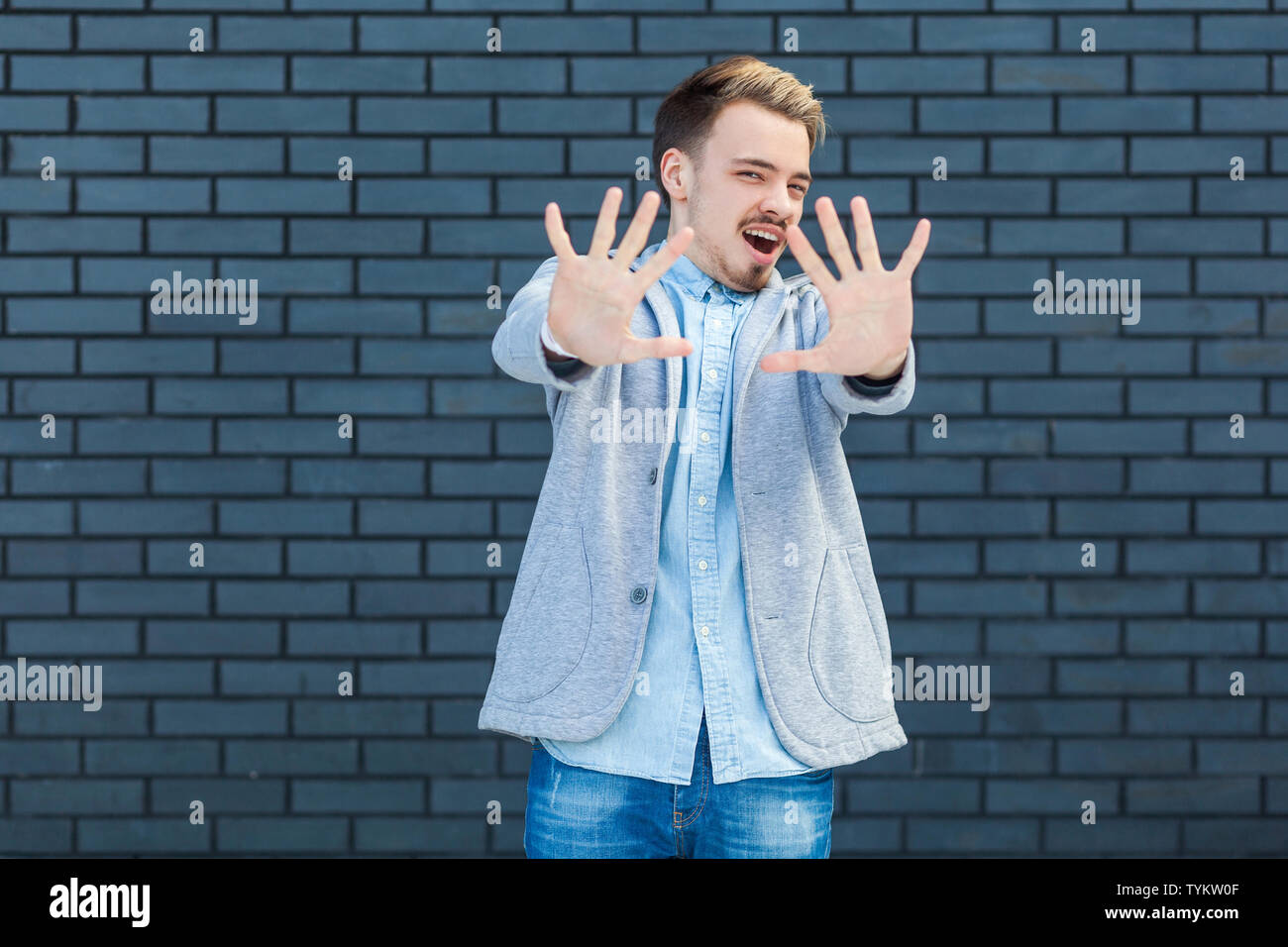 Man scared hands face hi-res stock photography and images - Alamy