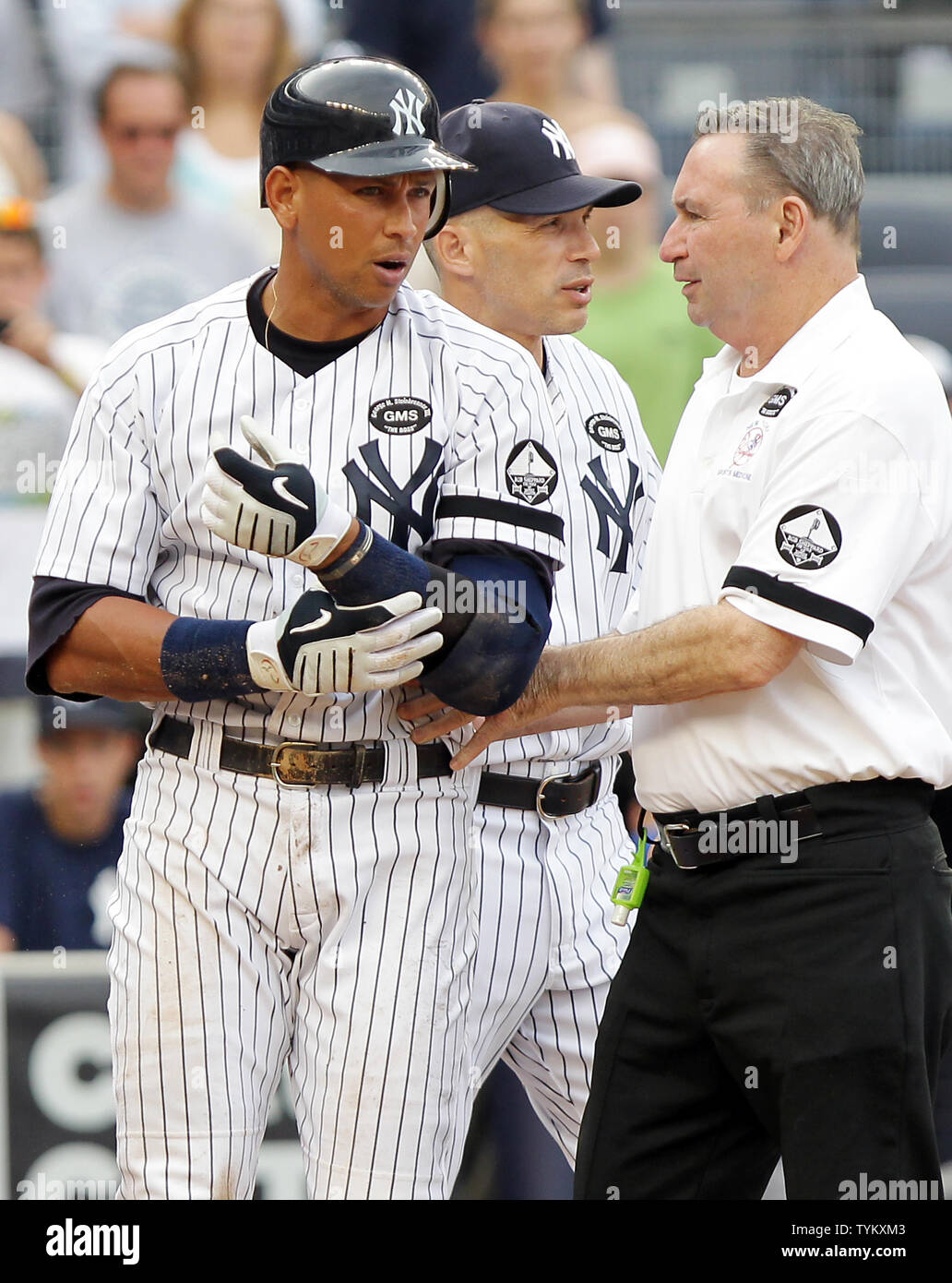 New York Yankees' Alex Rodriguez reacts after being hit by a pitch