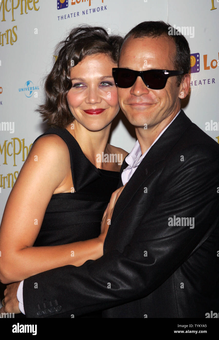 Maggie Gyllenhaal and husband Peter Sarsgaard arrive at the 'Nanny McPhee Returns' Premiere at the AMC Loews Lincoln Square Theater in New York on August 17, 2010.      UPI /Laura Cavanaugh Stock Photo