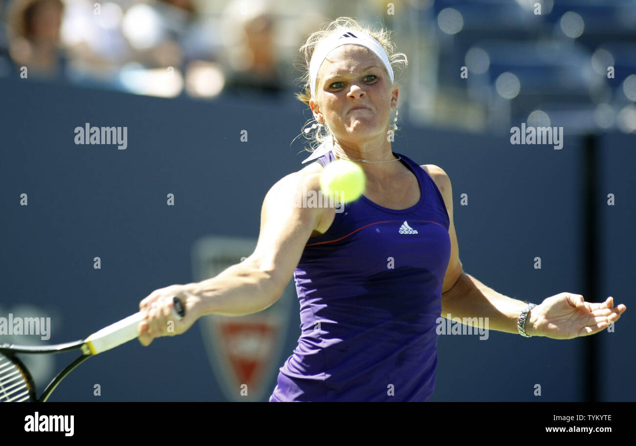 Melanie Oudin of the USA returns the ball to Olga Savchuk of Ukraine during first-round action at the U.S. Open held at the National Tennis Center on August 30, 2010 in New York.     UPI Photo/Monika Graff... Stock Photo