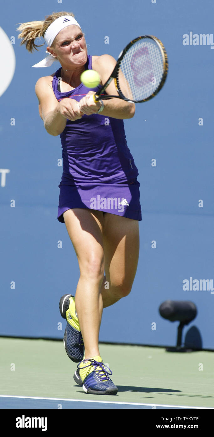Melanie Oudin of the USA returns the ball to Olga Savchuk of Ukraine during first-round action at the U.S. Open held at the National Tennis Center on August 30, 2010 in New York.     UPI Photo/Monika Graff... Stock Photo