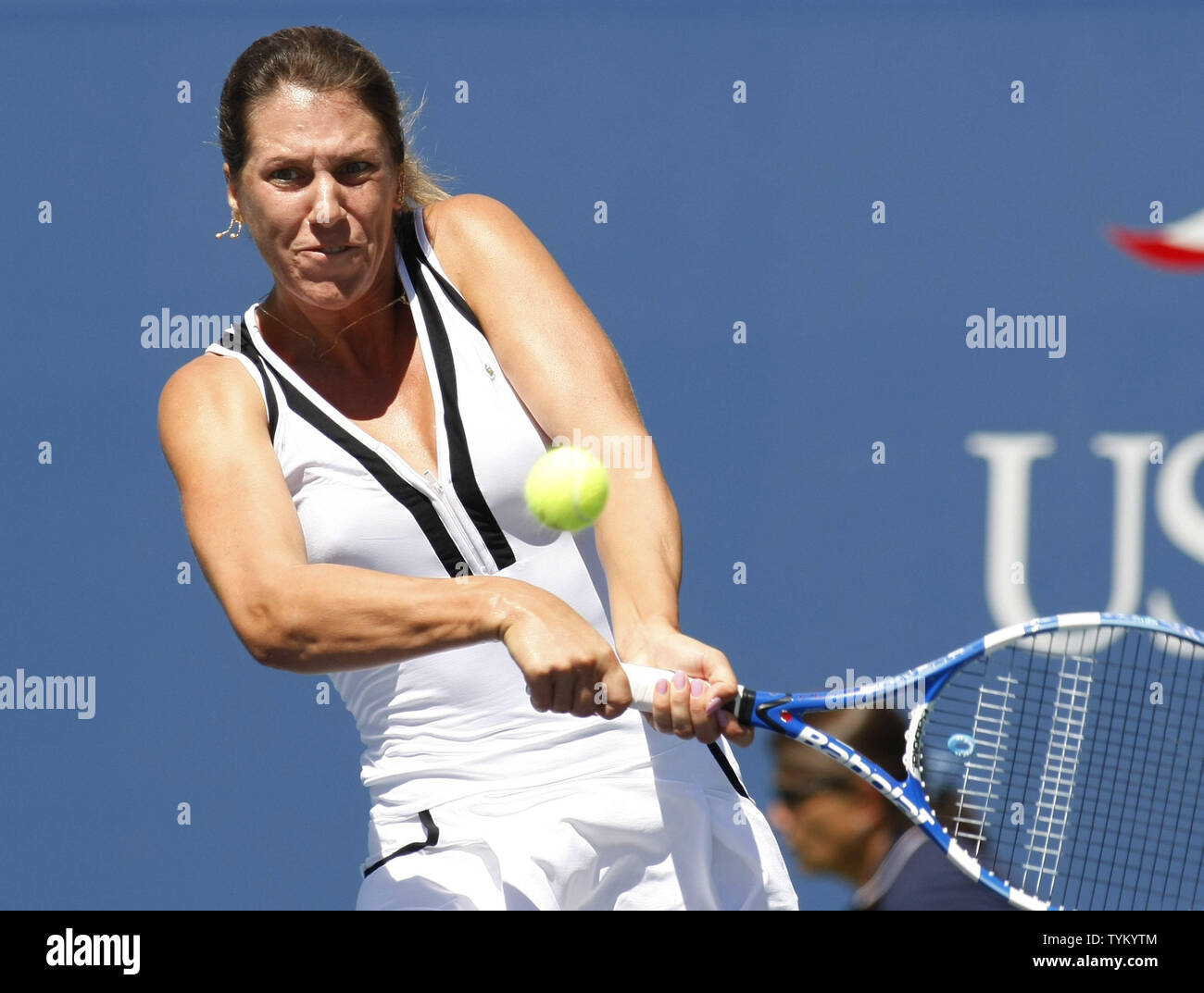Olga Savchuk of the Ukraine returns the ball to  Melanie Oudin of the USA during first-round action at the U.S. Open held at the National Tennis Center on August 30, 2010 in New York.     UPI Photo/Monika Graff... Stock Photo