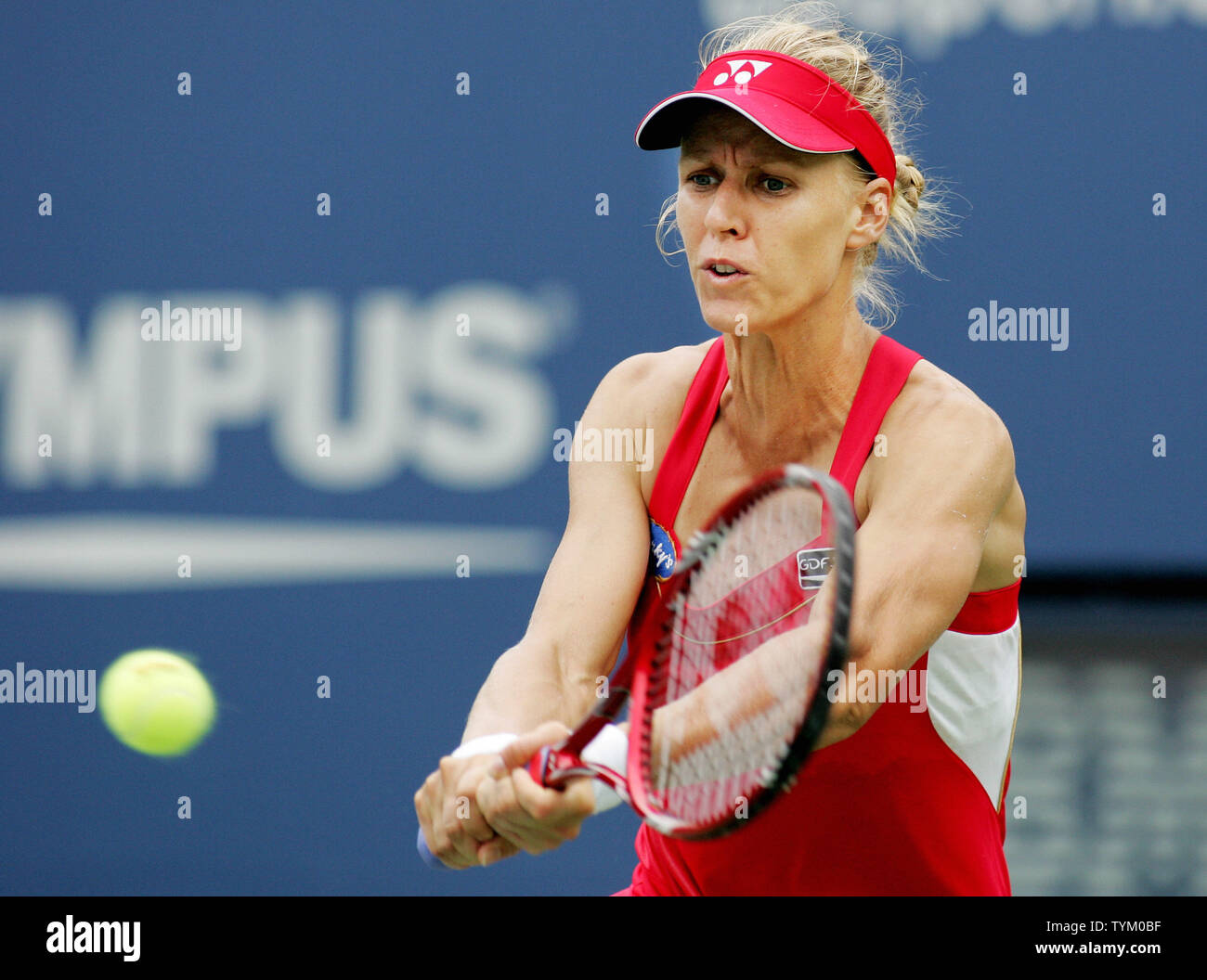Elena Dementieva of Russia returns the ball to Daniela Hantuchova of ...