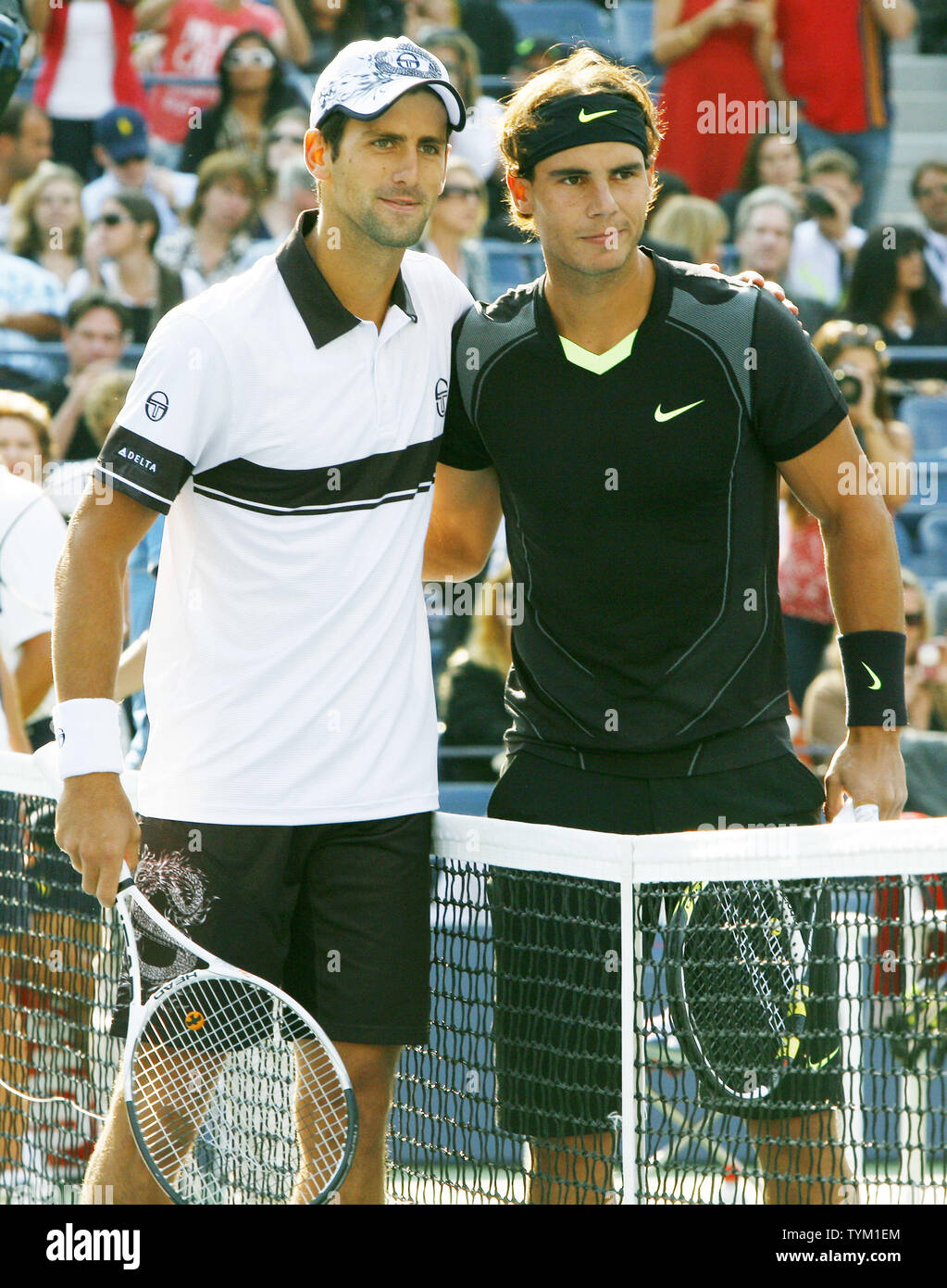 Third-seed Novak Djokovic (L) of Serbia and top seed Rafael Nadal of Spain  pose together before the start of their mens' final match at the U.S. Open  held at the National Tennis