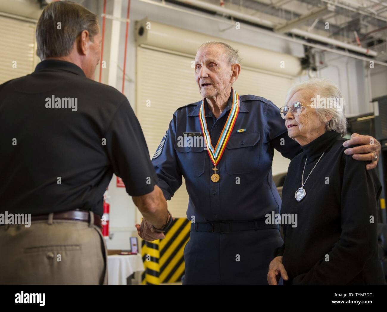 Russell Rhodes Retired Chief Master Sgt. Russell Rhodes and his wife, Charleen, greet ...