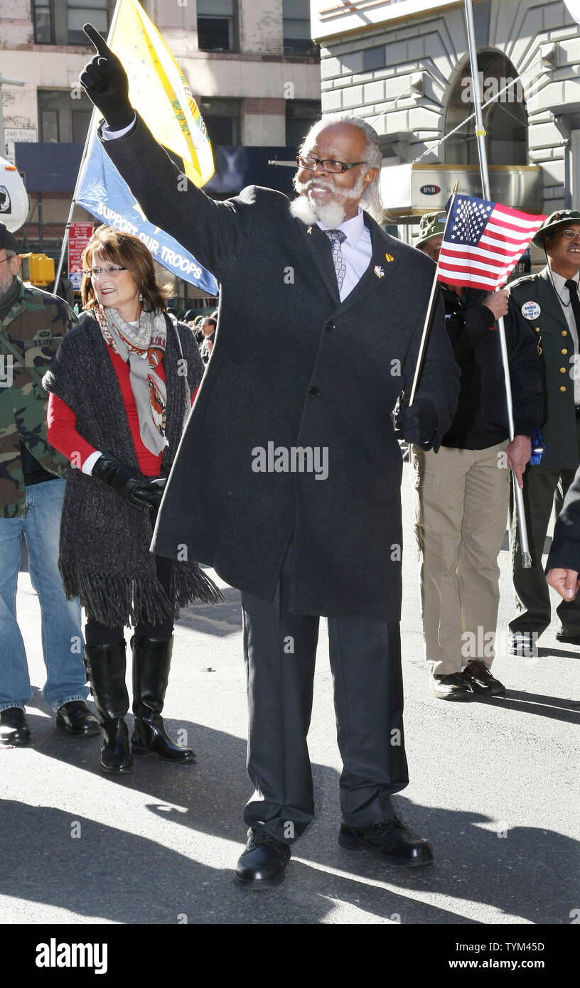 Former New York State gubernatorial candidate Jimmy MacMillan of the 'Rent is Too Damn High' party waves to fans as he marches up Fifth Avenue during the 91st annual Veterans Day Parade held on November 11, 2010 in New York City.    UPI Photo/Monika Graff Stock Photo