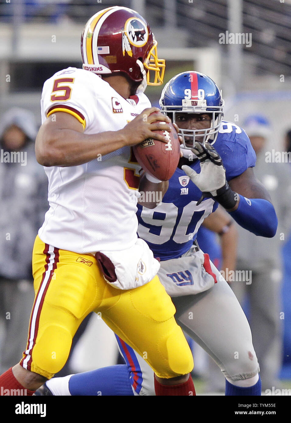 New York Giants Jason Pierre-Paul puts pressure on Washington Redskins quarterback Donovan McNabb in third quarter at New Meadowlands Stadium in week 13 of the NFL in East Rutherford, New Jersey on December 5, 2010. The Giants defeated the Redskins 31-7.     UPI /John Angelillo Stock Photo