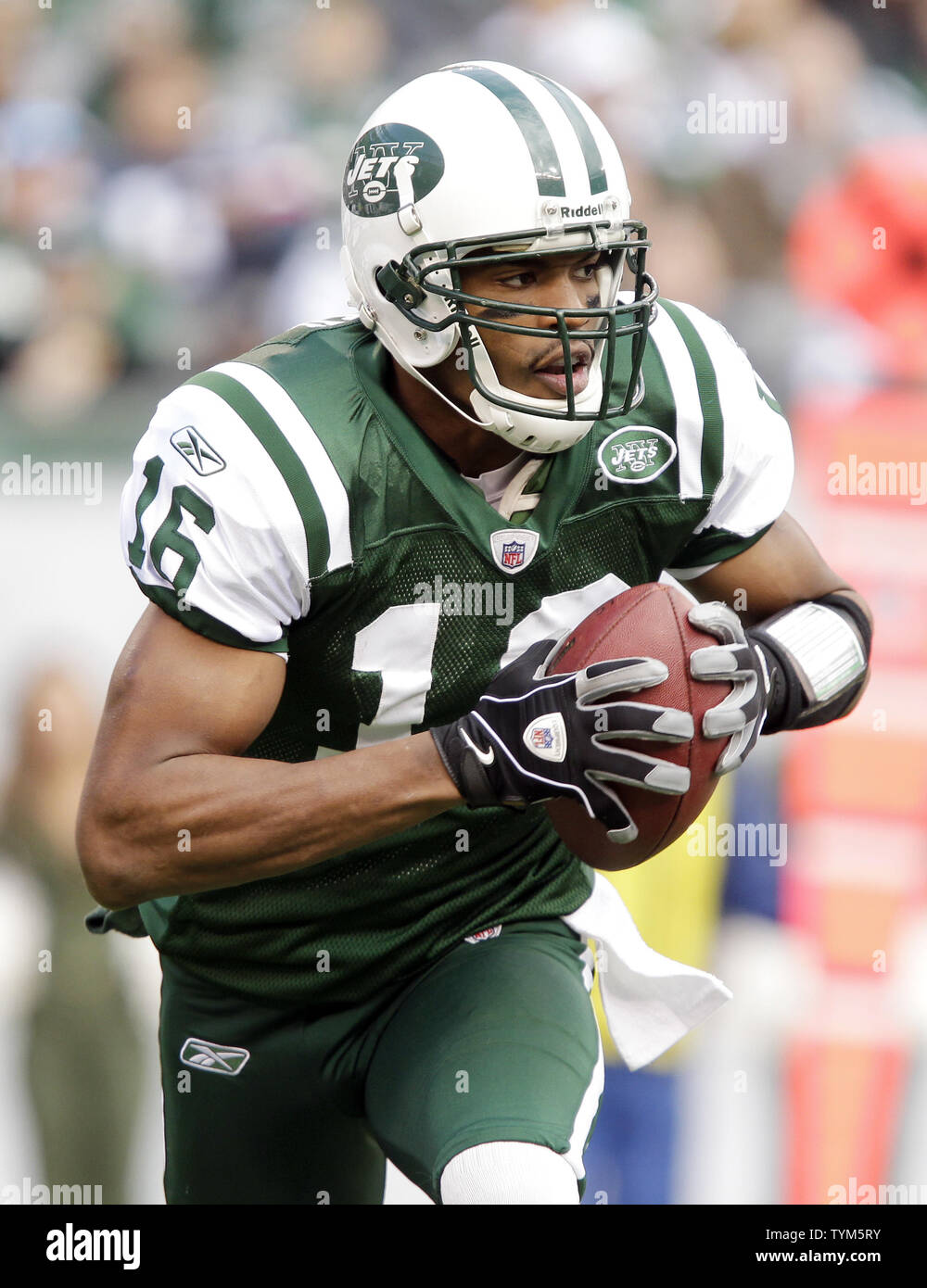 New York Jets quarterback Brad Smith runs out of the pocket