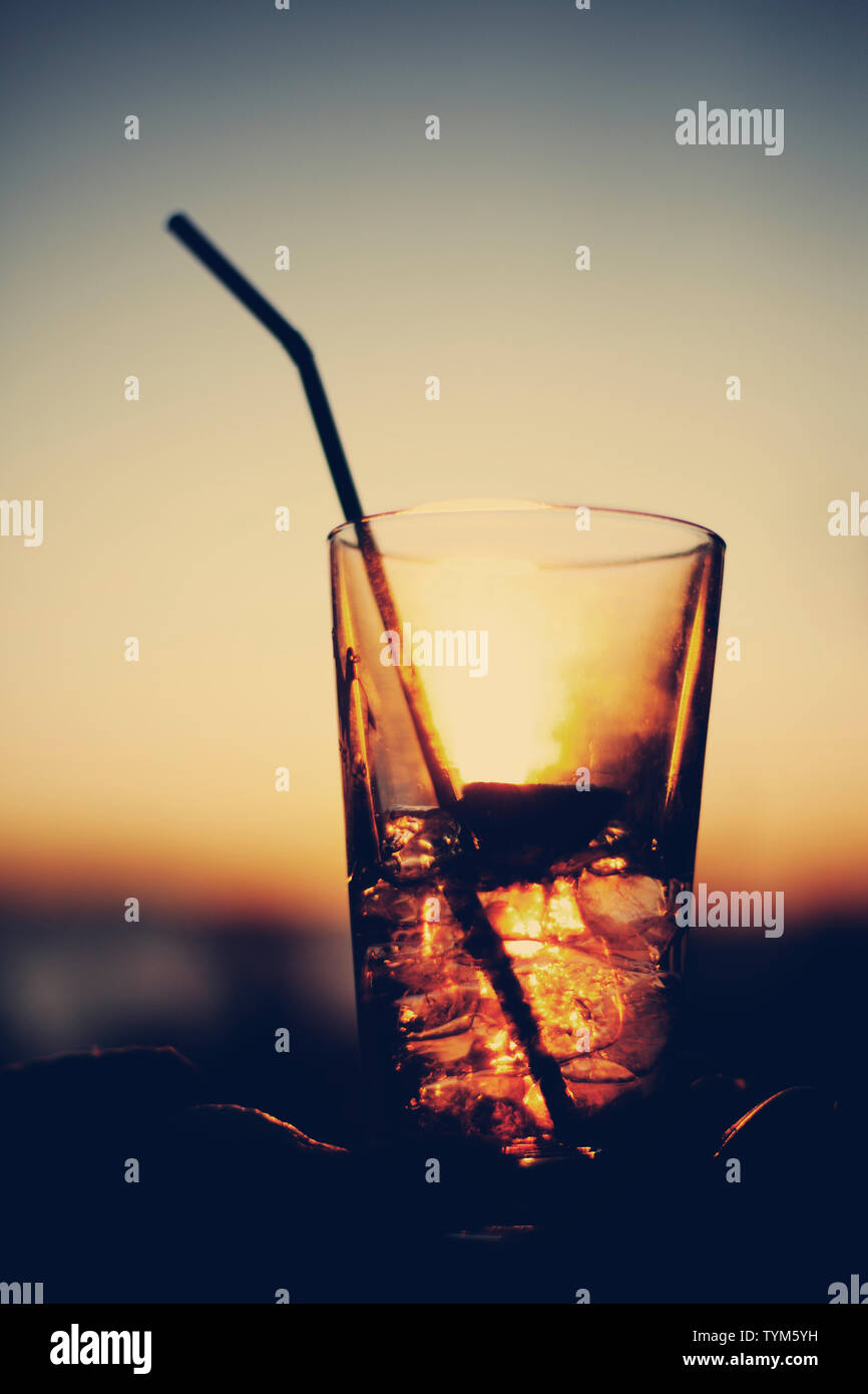 Drink in front of heaven during sunset Stock Photo