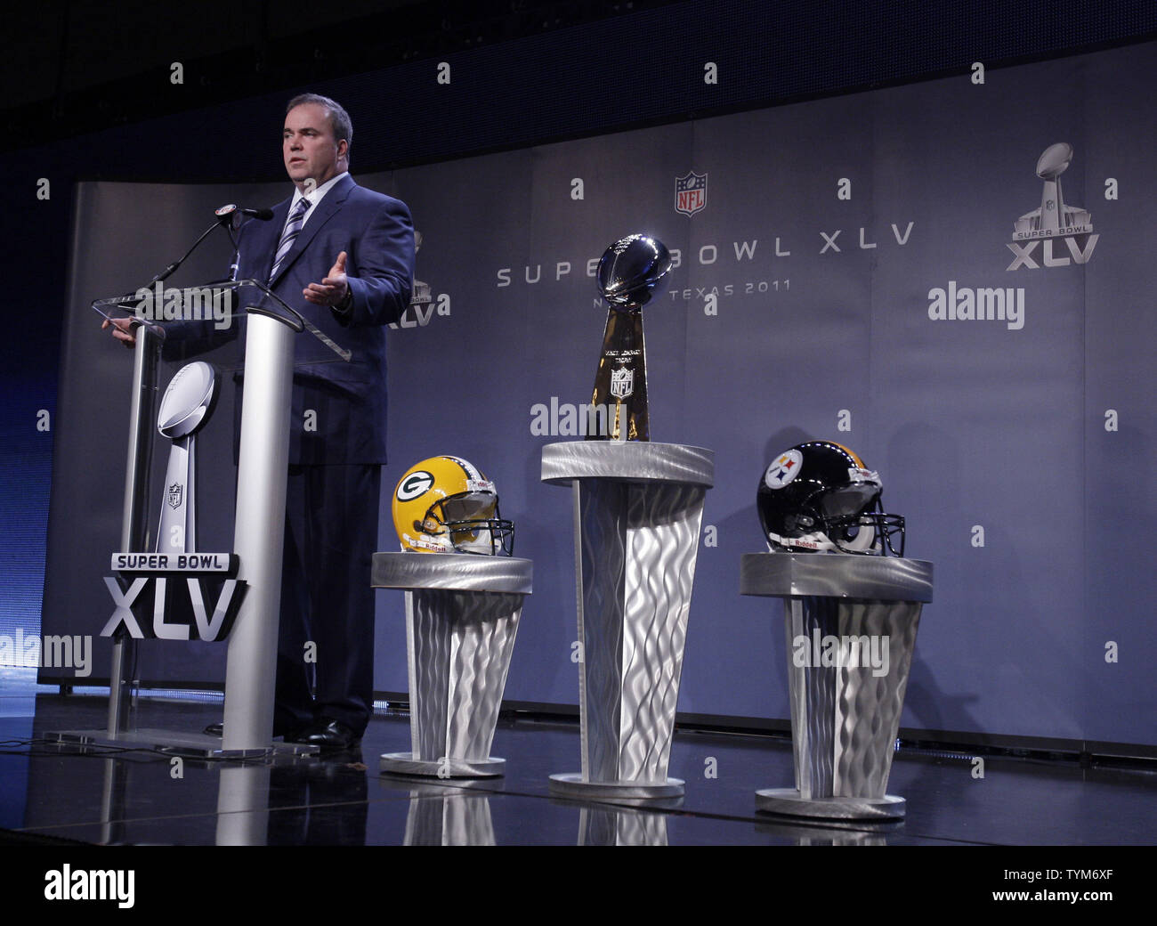 The Vince Lombardi Trophy stands between the helmets of the Pittsburgh  Steelers and the Green Bay Packers before the coaches speak to the media at  a press conference during the week of