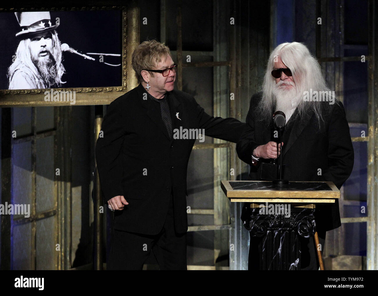 Elton John gets emotional as Leon Russell gets inducted into the Rock and Roll Hall of Fame at the Waldorf Astoria in New York City on March 14, 2011.  UPI/John Angelillo Stock Photo
