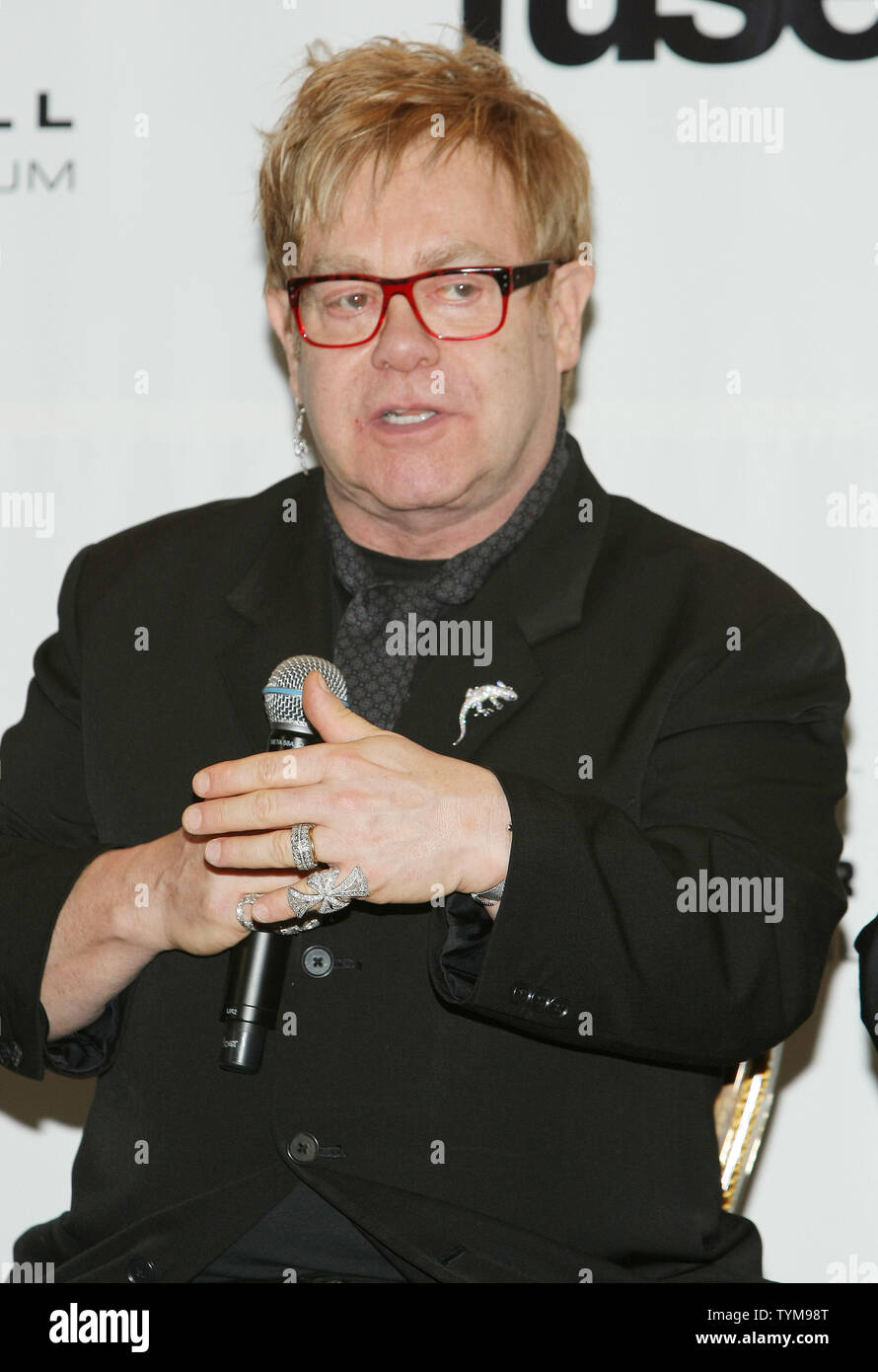 Elton John talks to reporters at the Rock and Roll Hall of Fame induction ceremony where he will introduce inductee Leon Russell at the Waldorf-Astoria hotel in New York on March 14, 2011.      UPI Photo/Monika Graff... Stock Photo