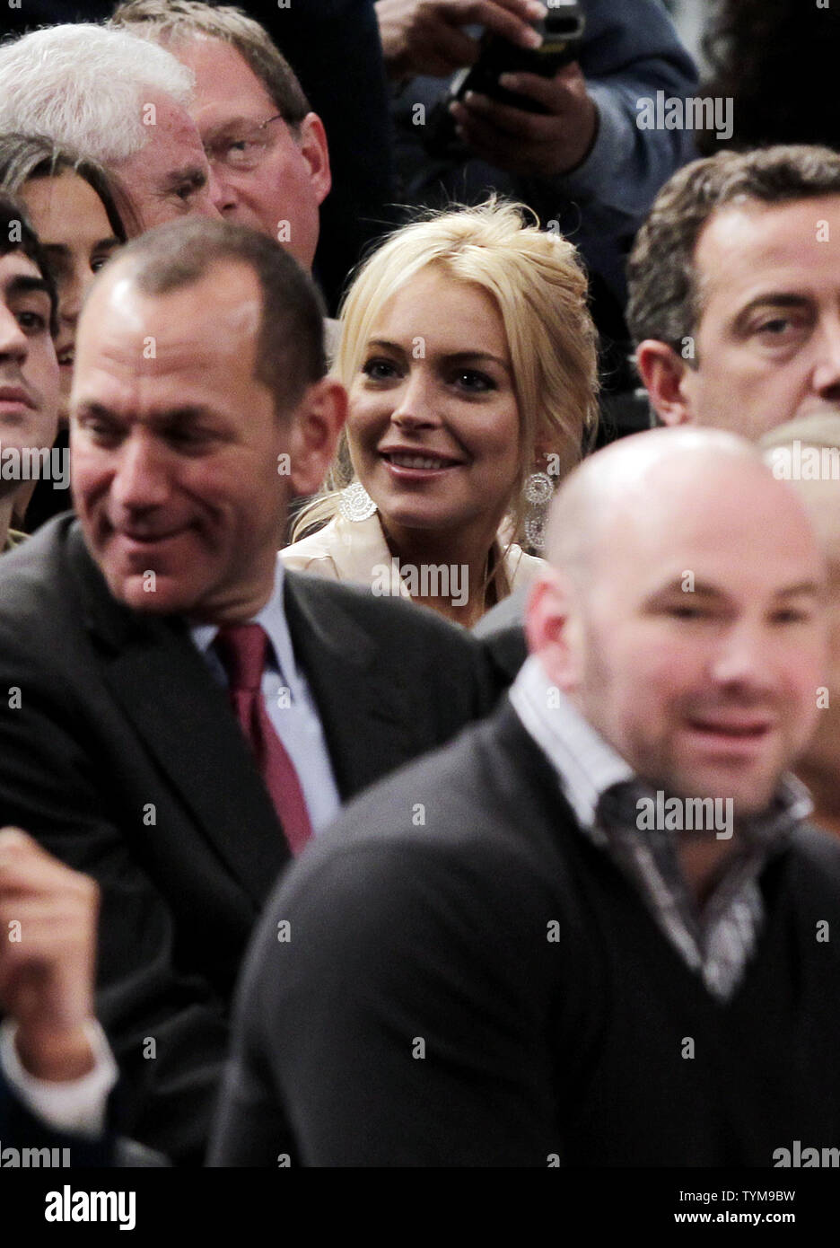 Actress Lindsay Lohan watches the Memphis Grizzlies play the New York