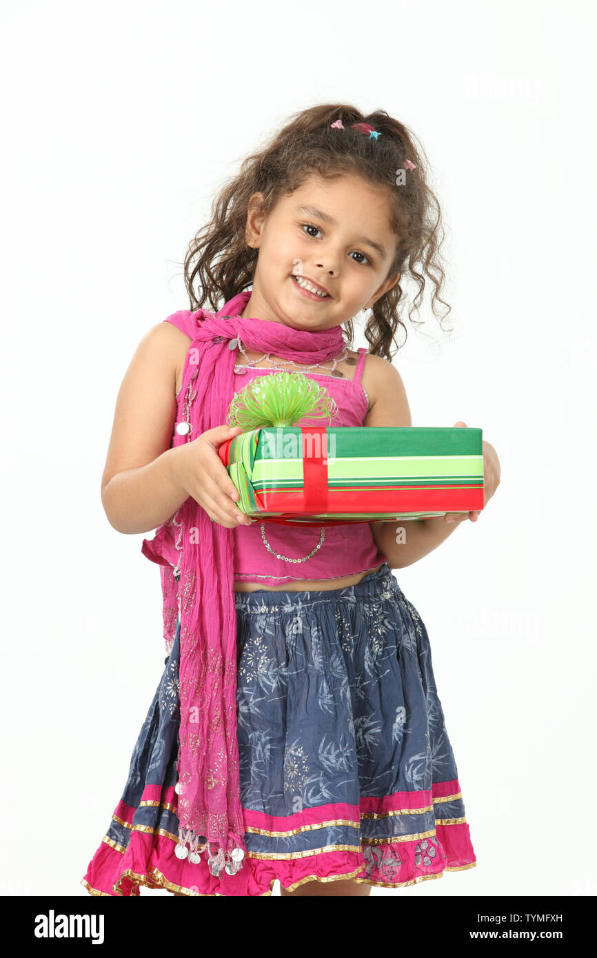 Portrait of a girl holding a gift box Stock Photo