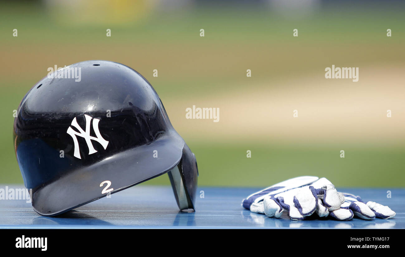 The helmet and batting glove of New York Yankees Derek Jeter are placed on a table during a ceremony celebrating Jeter becoming the first Yankee ever to have 3000 career hits before the game against the Tampa Bay Rays at Yankee Stadium in New York City on August 13, 2011.      UPI/John Angelillo Stock Photo