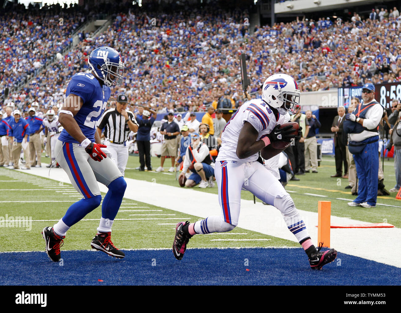 New York Giants Corey Webster watches Buffalo Bills Stevie Johnson score a  9 yard touchdown in the fourth quarter in week 6 of the NFL season at  MetLife Stadium in East Rutherford,