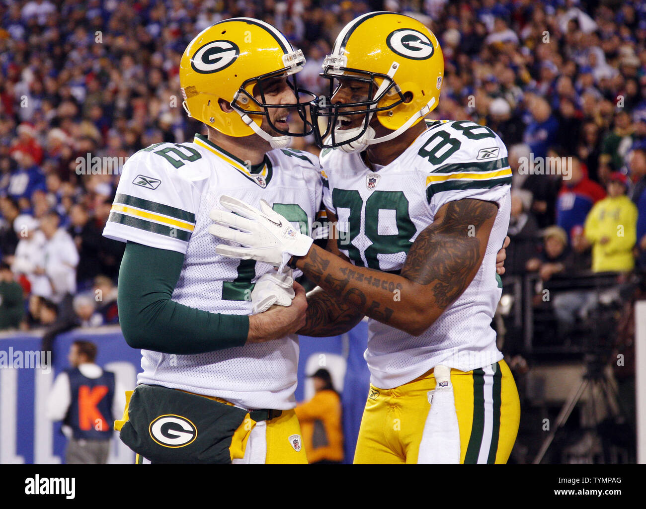Green Bay Packers Jermichael Finley celebrates with Aaron Rodgers
