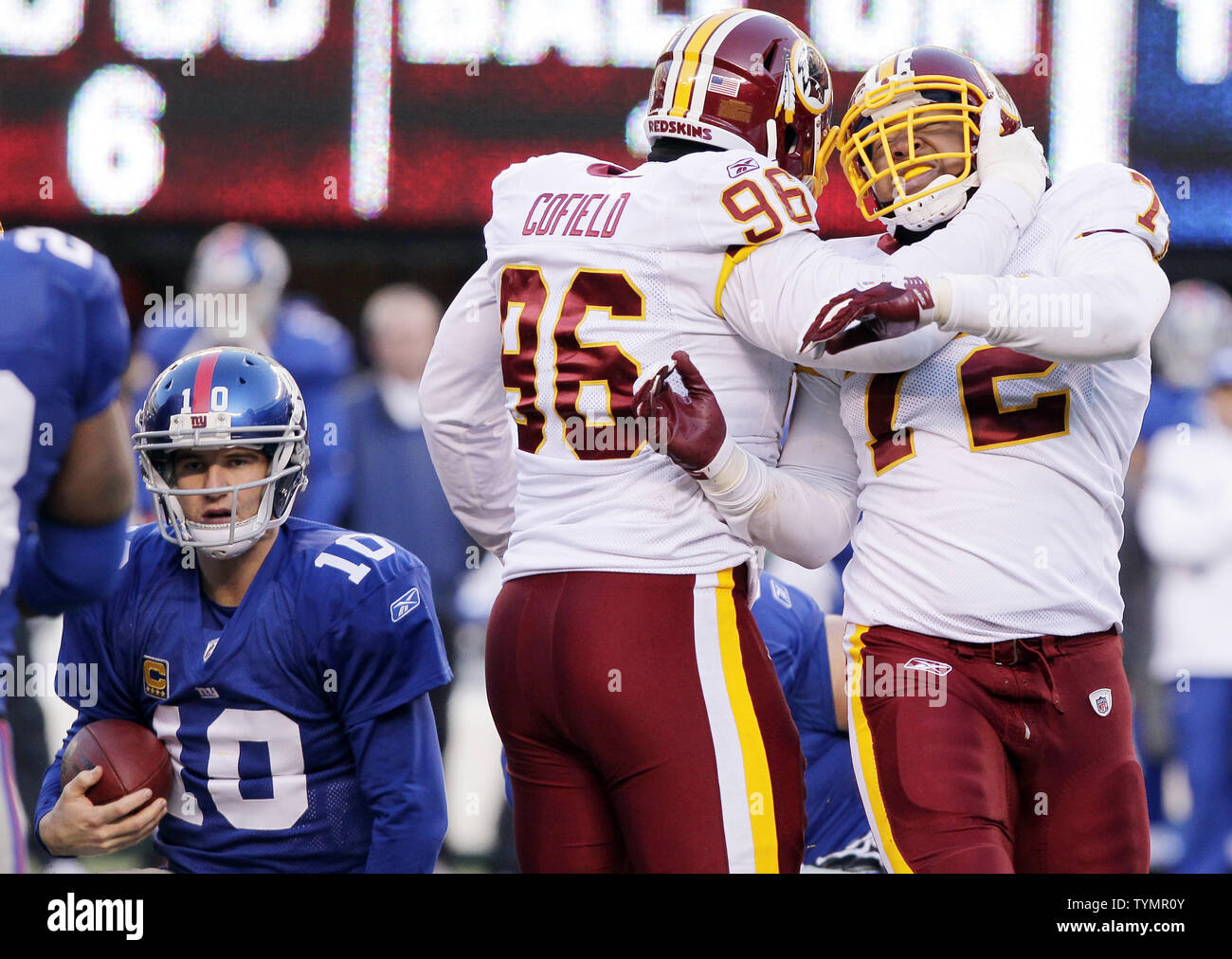 Washington Redskins Stephen Bowen celebrates with Barry Cofield