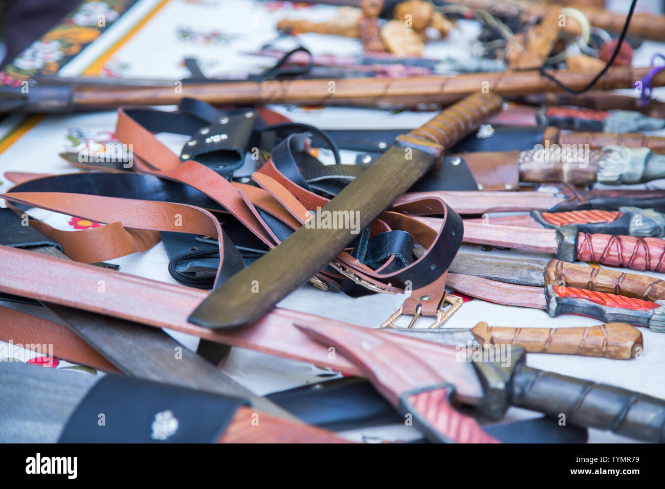 Handmade wooden toy knives Stock Photo - Alamy