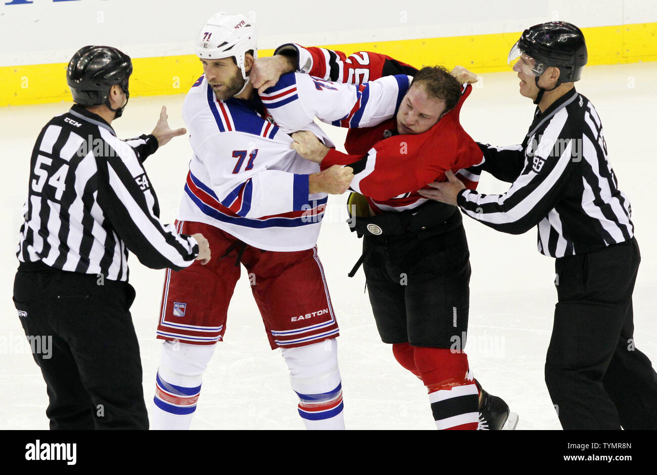 New Jersey Devils Cam Janssen and New York Mike Rupp fight in the first  period at the Prudential Center in Newark, New Jersey on December 20, 2011.  UPI/John Angelillo Stock Photo - Alamy