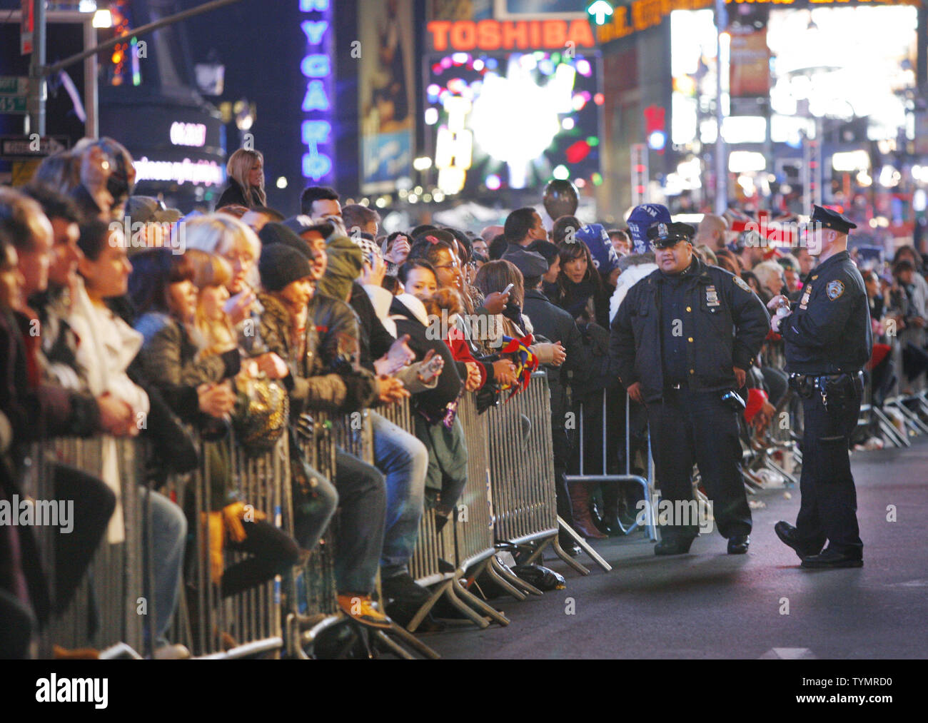 New York City Police officers keep guard as hundreds of thousands of ...