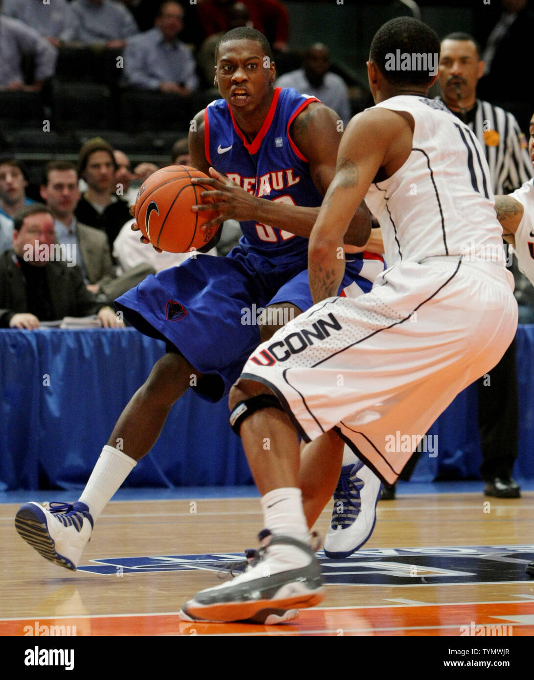 DePaul's Charles McKinney tries to get past Ryan Boatright of University of Connecticut in the first half of first round play at the NCAA Big East Basketball Championship at Madison Square Garden in New York City on March 6, 2012.   UPI/Monika Graff Stock Photo